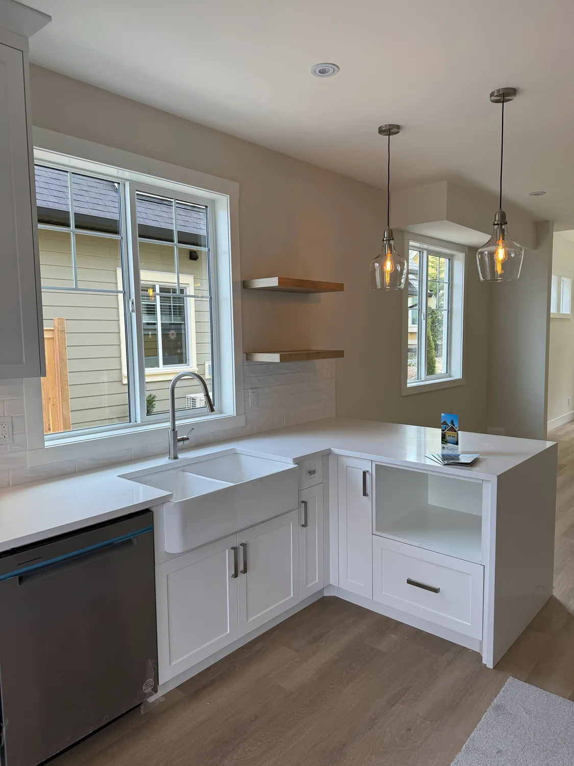 Bright kitchen with painted light walls and white cabinetry